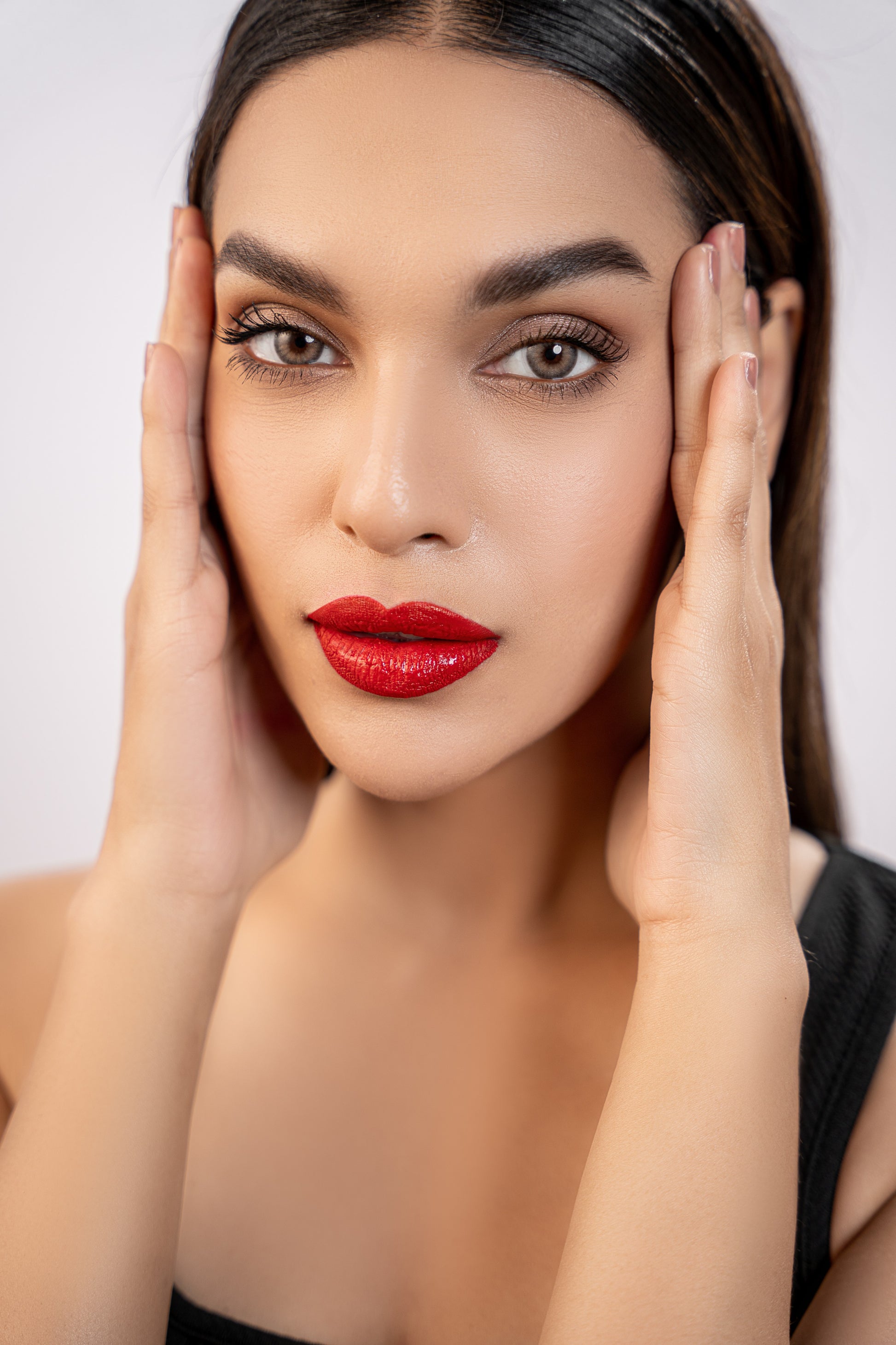 model showing shiny red lip gloss 