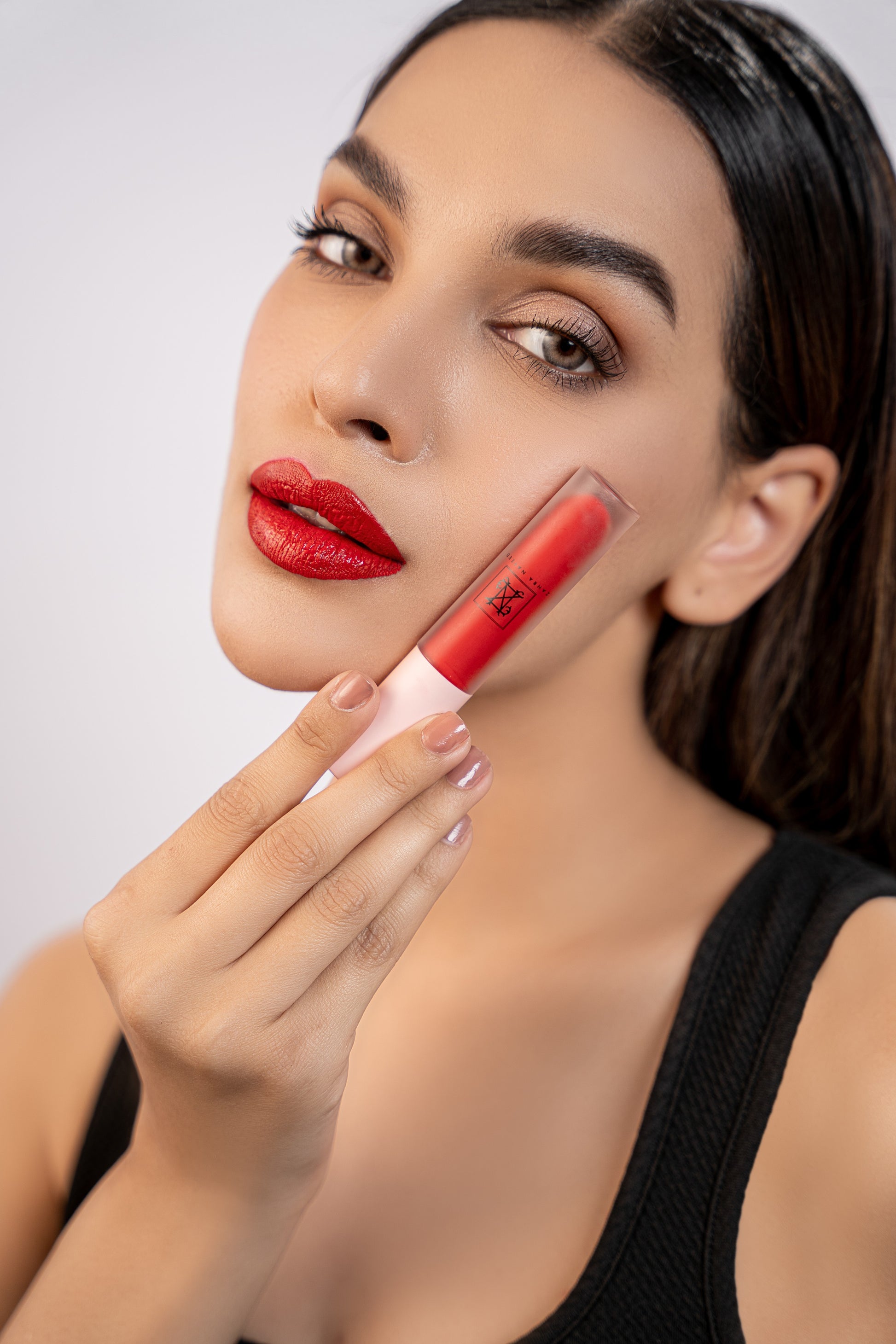 shiny red lip gloss by zahra naveed